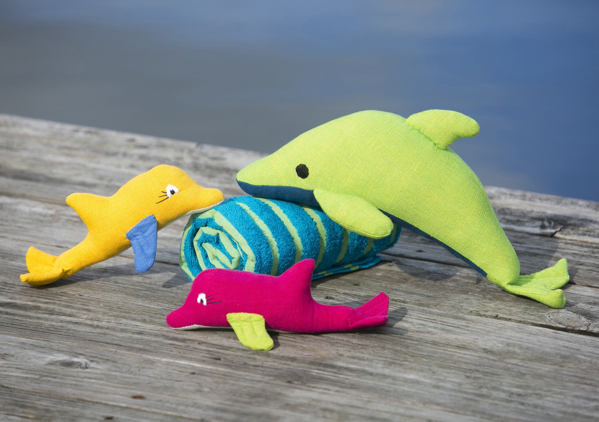 These dolphins are ready to play! (shown in both sizes)