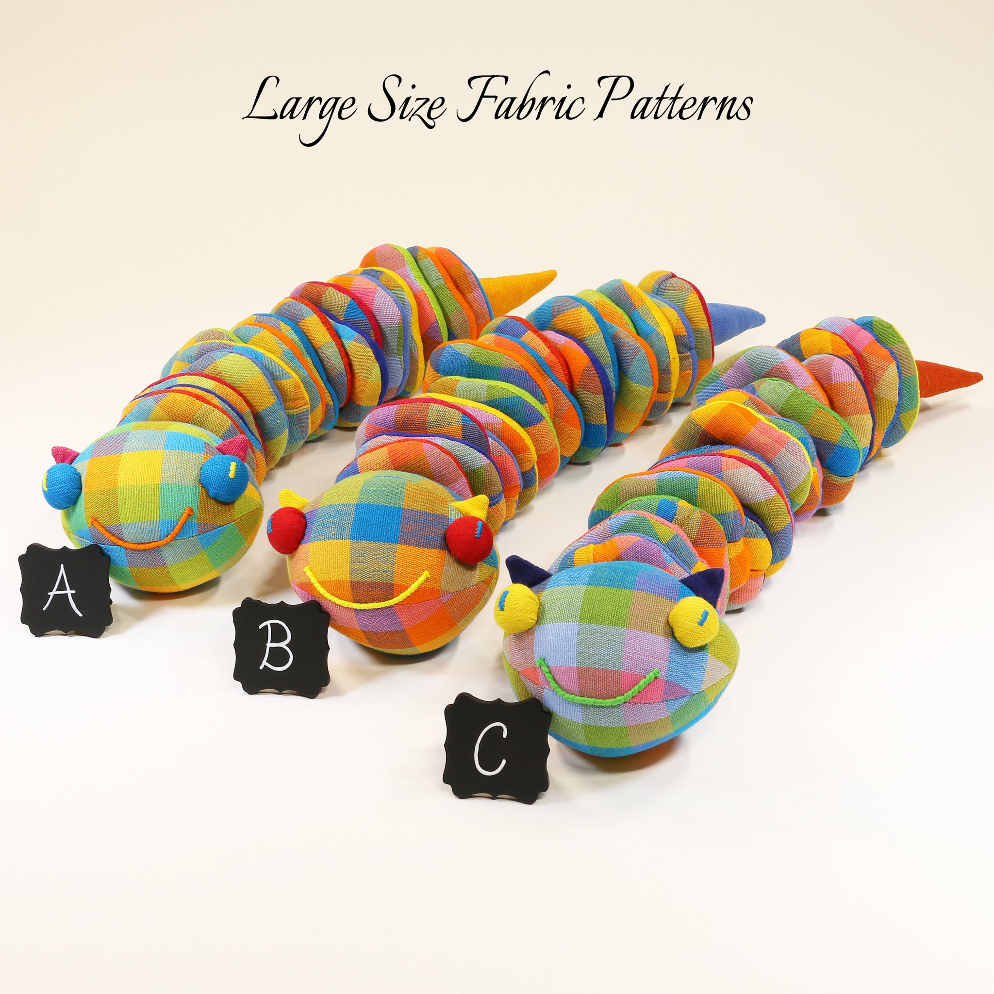 Casey, the Caterpillar – large size fabric patterns shown