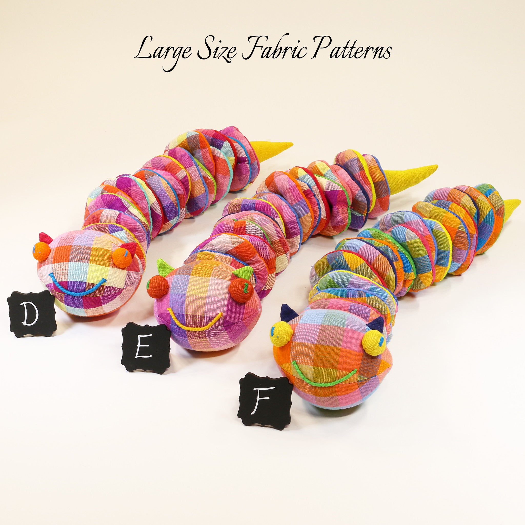 Casey, the Caterpillar – large size fabric patterns shown
